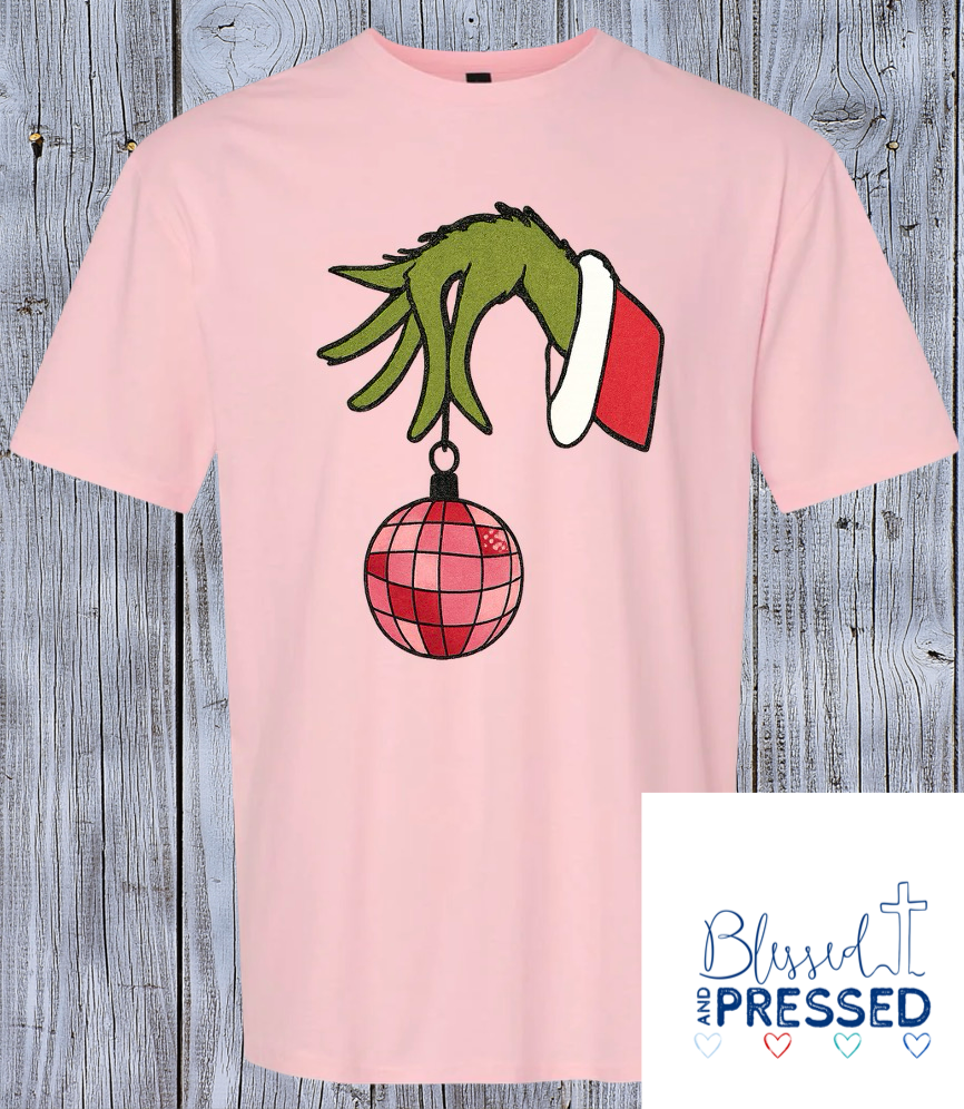 51- Grinch Hand with Christmas Ornament T-Shirt